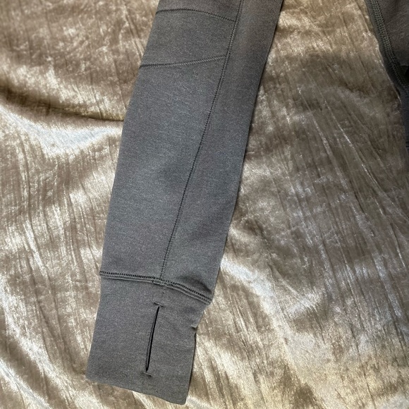 Lululemon Gray Jacket with a hoodie inside of zipper in case it rains on you - Picture 6 of 17